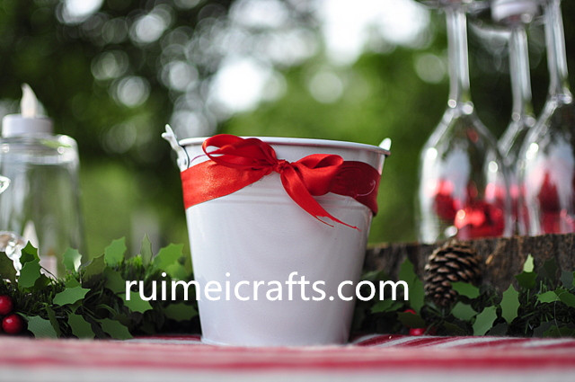 metal bucket with ribbon for holiday party.jpg